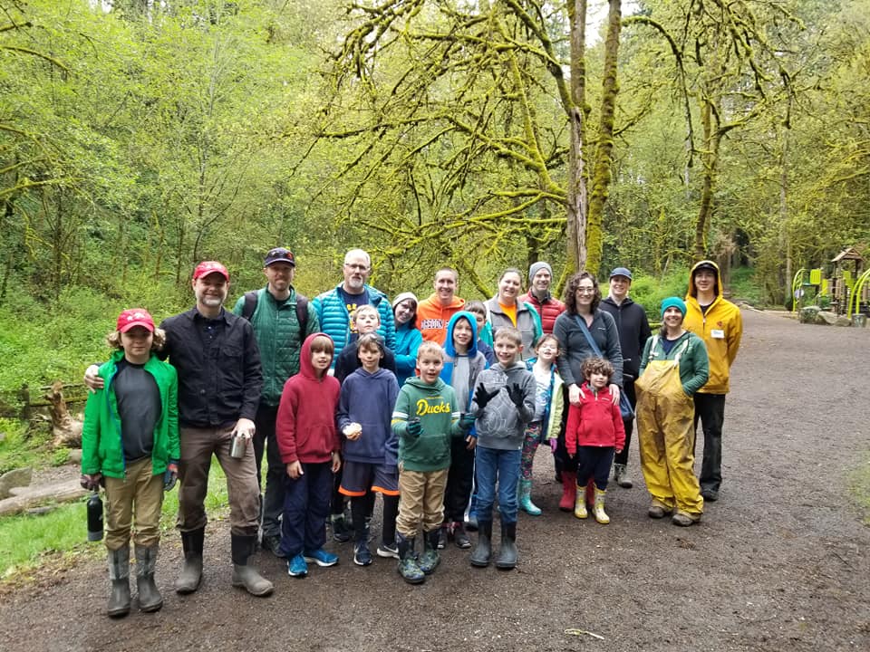 A group of 20 people in the forest